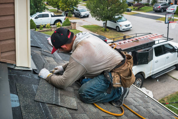 Professional Roofing technician working in Irvington, KY